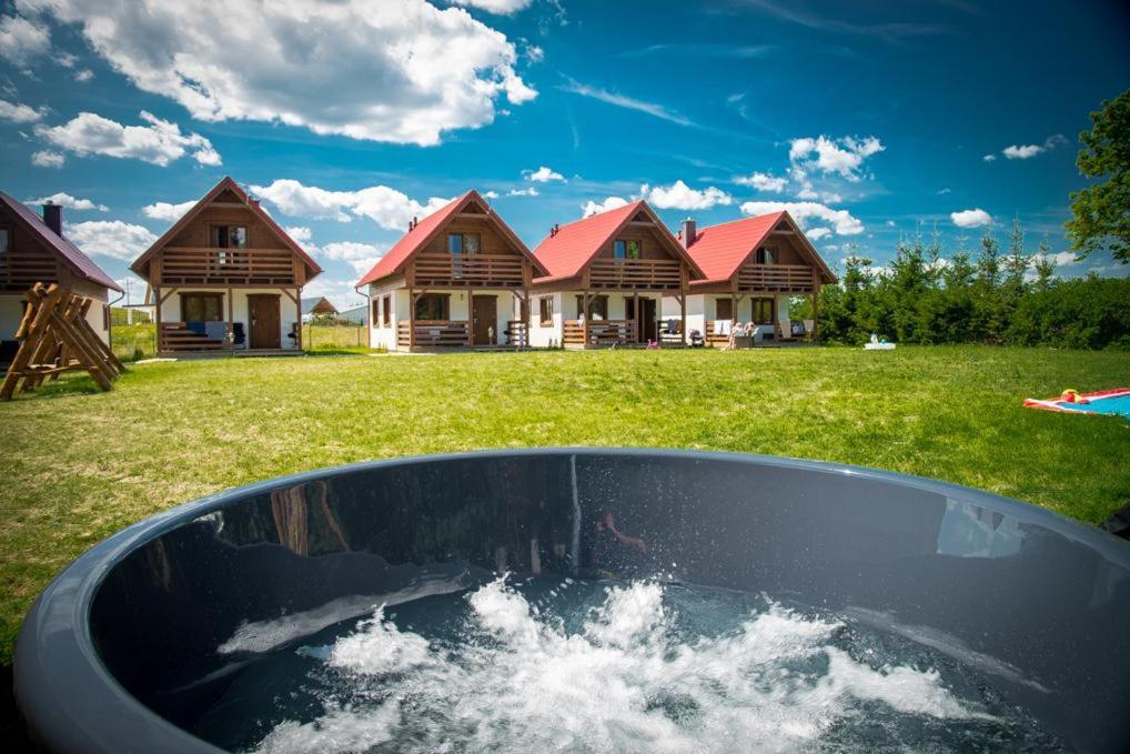 Kalinowy Sad Domki Z Jacuzzi I Sauna Mikołajki Eksteriør billede